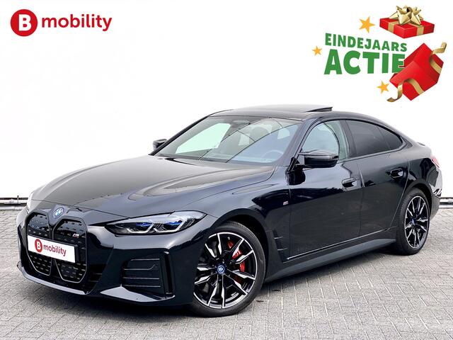BMW i4 M50 544Pk High Executive 84 kWh Elektrisch verstelbare stoelen | Trekhaak 1600kg | Schuif/Kanteldak | Driving Assistant Professional | Harman Kardon Sound System | Head Up Display | Verwarmbaar stuurwiel | Interieurlijsten Carbon Fibre | Parking Assist.