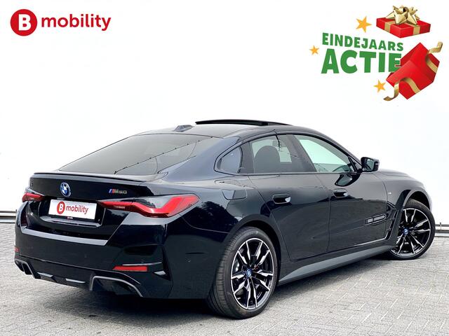 BMW i4 M50 544Pk High Executive 84 kWh Elektrisch verstelbare stoelen | Trekhaak 1600kg | Schuif/Kanteldak | Driving Assistant Professional | Harman Kardon Sound System | Head Up Display | Verwarmbaar stuurwiel | Interieurlijsten Carbon Fibre | Parking Assist.