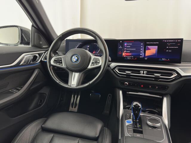 BMW i4 eDrive40 High Executive 84 kWh (3-Fase) [SOH-97%] (INCL-BTW) *AUT | HEAD UP | FULL-LED | HARMAN KARDON | ADAPTIVE-CRUISE | WIDE-SCREEN-DIGI-COCKPIT | DAB+ | CAMERA | AMBIENT-LIGHT | CARPLAY | LEATHER SPORT-SEATS | | 19''ALU*