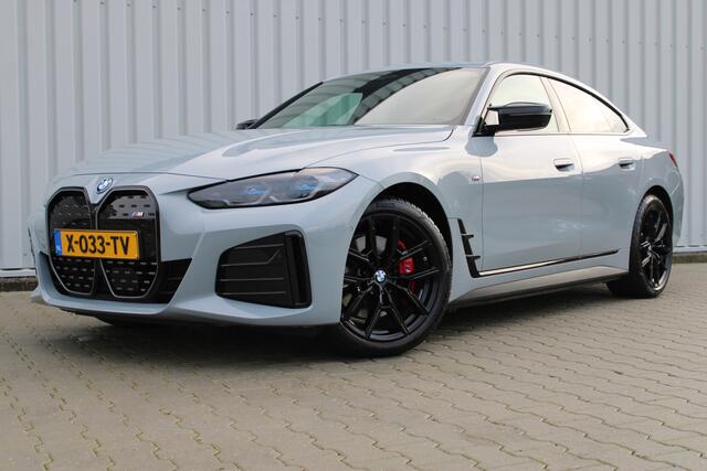 BMW i4 M50 High Executive 84 kWh | Incl. 12 maanden garantie | Assisted driving | Climate control | 360° camera | Uitklapbare trekhaak | Stoel/stuurverwarming | Head-up display | Schuif/kantel dak |