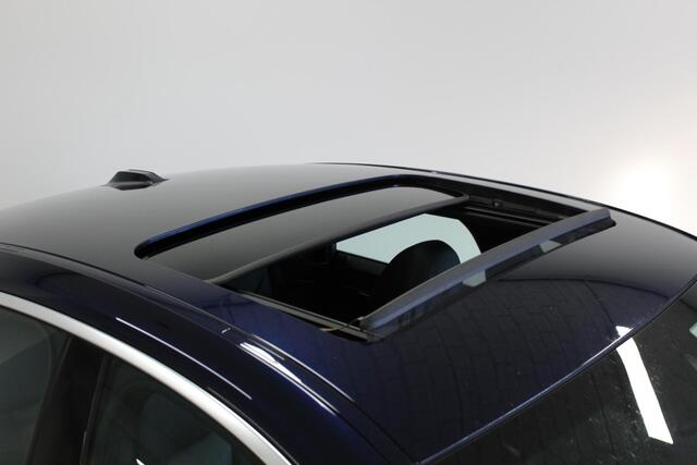 BMW i4 eDrive40 High Executive 84 kWh | SCHUIF/-KANTELDAK | CARPLAY | DAB | NAVIGATIE | HARMAN/KARDON | CAM |