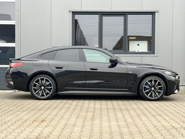 BMW i4 eDrive40 High Executive 84 kWh M Sport | Trekhaak | 19 inch | Laser light