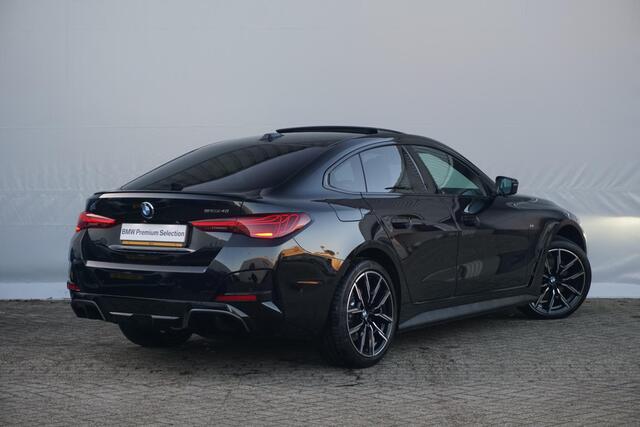 BMW i4 eDrive40 M Sportpakket Pro 19'' / Individual Interieur / Schuif-/kanteldak / Elektrisch verstelbare stoelen / Harman Kardon / Trekhaak