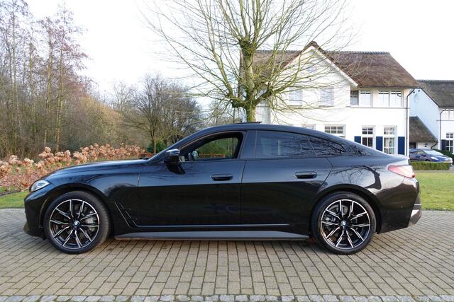 BMW i4 eDrive35 High Executive 70 kWh | Harman Kardon | Head-Up | LED | Schuif/Kanteldak | Adaptive Cruise | Leder |