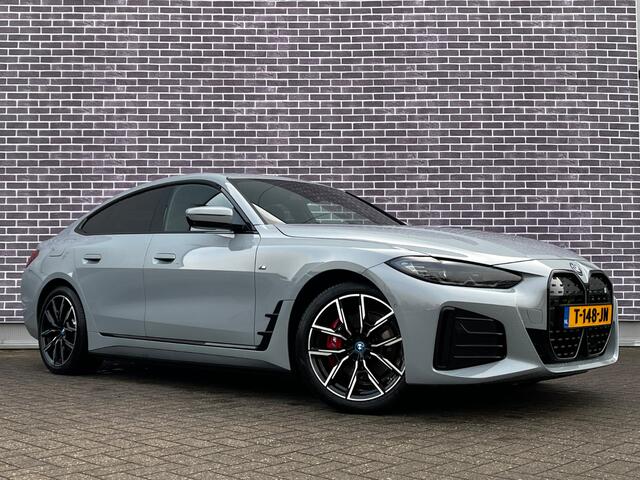 BMW i4 eDrive40 High Executive 84 kWh / Trekhaak / 360Camera / Head-up / Leder / 19'' / Navigatie / Stoelverwarming / DAB / Cruise Control