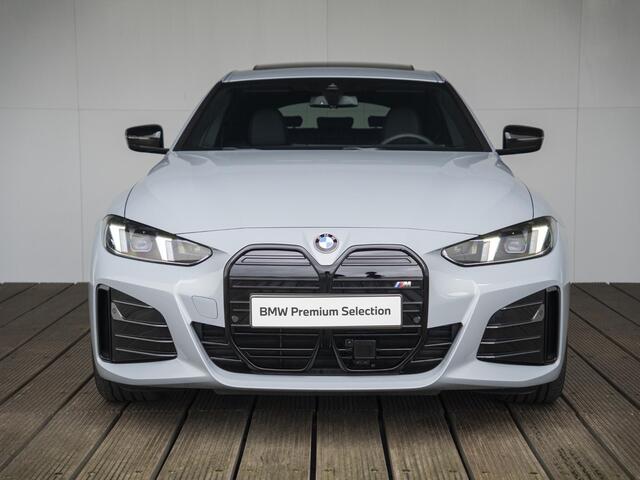 BMW i4 eDrive35 | M Sportpakket | Comfort Pack | Stuurwielrand verwarmd | Comfort Access | Achteruitrijcamera | Schuif-/kanteldak | Stoelverwarming