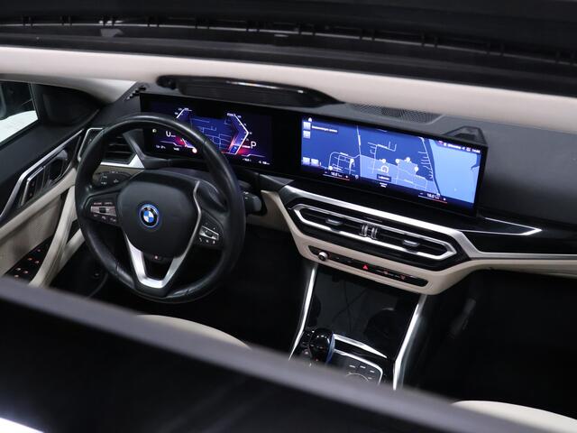 BMW i4 eDrive40 84 kWh [SCHUIFKANTELDAK, ADAPTIVE CRUISE CONTROL, APPLE CARPLAY, ANDROID AUTO, ACHTERUITRIJCAMERA, PDC V+A,STUURVERWARMING, BMW LED, NIEUWSTAAT]