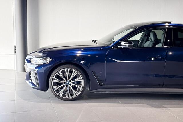 BMW i4 M50 High Executive 84 kWh | Glazen schuif-/kanteldak | Comfort Access | Stoelverwarming | Head-Up Display |