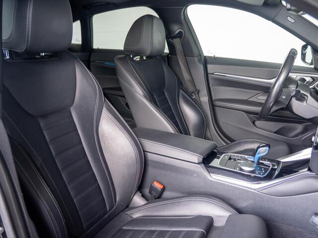 BMW i4 eDrive40 | M Sport | Stoelverwarming | Schuif-/kanteldak | Active Cruise Control | Parking Assistant Plus | 19''