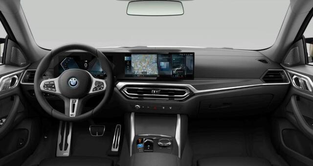 BMW i4 M50 High Executive 84 kWh Schuiif/kanteldak - Elektrisch verstelbare voorstoelen/actieve stoelventilatie - Harman Kardon - Active Cruise Control - Parking Assistant Plus - Ambiance verlichting -