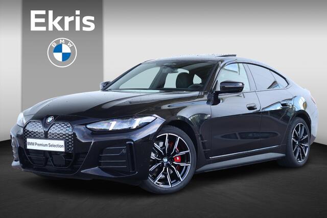 BMW i4 eDrive40 M Sport Edition 84 kWh M Sportpakket Pro/ Rubin-Metallic Individual Special Request Lakkleur/ Harman-Kardon/ Trekhaak/ Driving Assistant Professional
