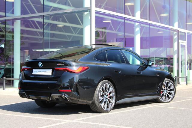 BMW i4 M50 / Schuif-kanteldak / Trekhaak / Laserlight / M Adaptief onderstel / Parking Assistant Plus / Comfort Access