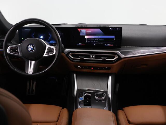 BMW i4 eDrive35 High Executive 70 kWh | M-Pakket | SOH 96% | HUD | Sportstoelen elektrisch verstelbaar + Geheugen | Camera | DAB | Apple CarPlay/Android Auto | Adaptieve Cruise Control | Ele. kofferdeksel |