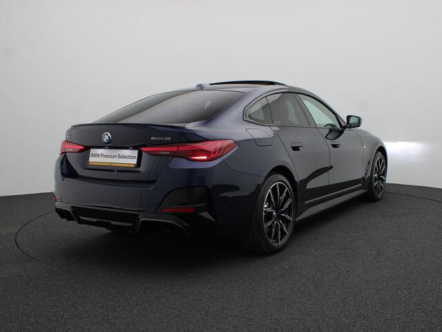 BMW i4 eDrive35 M Sport Edition | Comfort Pack | Stuurwielrand Verwarmd | Trekhaak | Schuifdak | Active Cruise Control | 19''