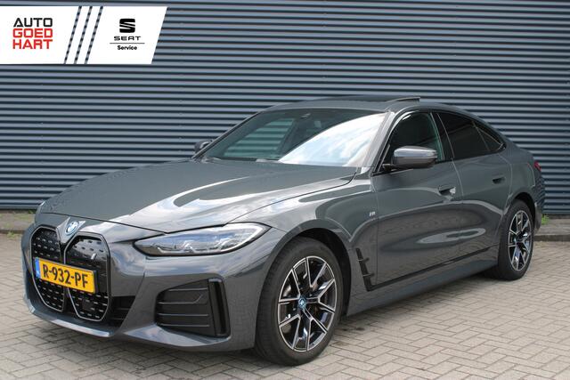 BMW i4 eDrive40 84 kWh M-Sport Dravitgrau Schuif-/kanteldak Leer Harman-Kardon Camera