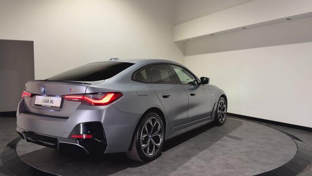 BMW i4 M50 84 kWh M Sport Pro | SOH 97,6% | el. Schuif/kanteldak | el. stoelen met memory | HUD | Unieke kleur