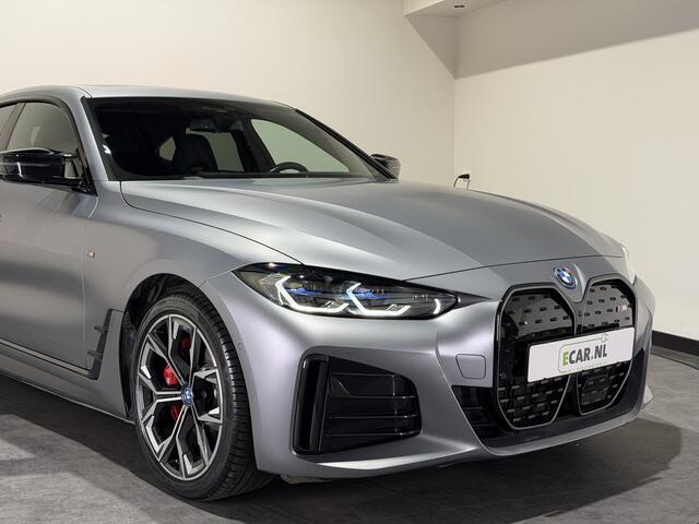 BMW i4 M50 84 kWh M Sport Pro | SOH 97,6% | el. Schuif/kanteldak | el. stoelen met memory | HUD | Unieke kleur