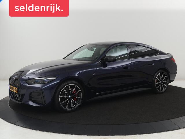 BMW i4 M50 High Executive 84 kWh | SOH 94,4% | Leder | Adaptive cruise | xDrive | Stoelverwarming | Head-up | Harman/Kardon | Carplay | Sfeerverlichting | 360 camera | Park assist | Elektrische achterklep