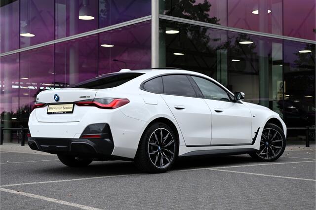BMW i4 eDrive40 High Executive M Sport / Achteruitrijcamera / Comfort Access / Active Cruise Control / Live Cockpit Professional / Stoelverwarming
