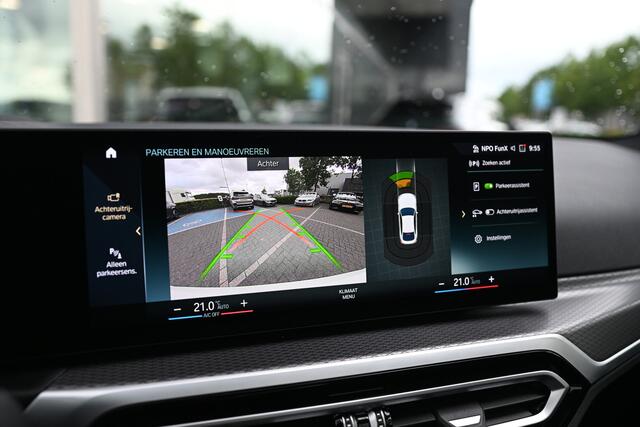 BMW i4 eDrive40 High Executive M Sport / Achteruitrijcamera / Comfort Access / Active Cruise Control / Live Cockpit Professional / Stoelverwarming