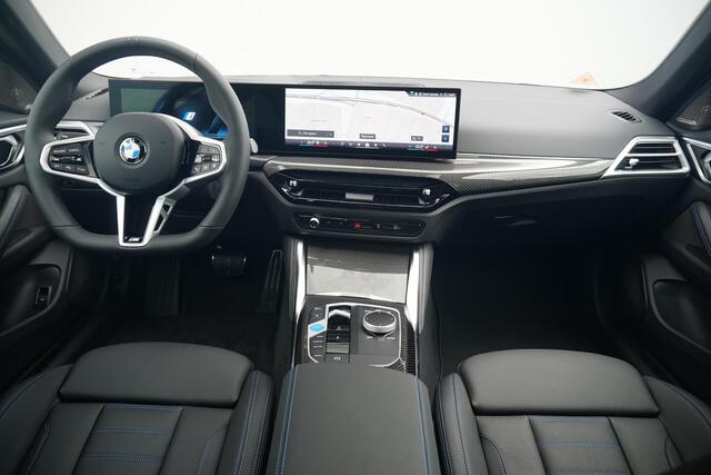 BMW i4 eDrive40 | M Sportpakket Pro | Harman Kardon | Active Cruise Control | Elektrisch verstelbare stoelen | Trekhaak