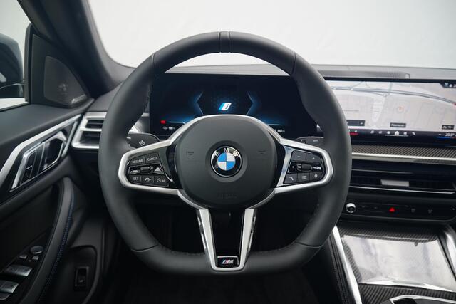 BMW i4 eDrive40 | M Sportpakket Pro | Harman Kardon | Active Cruise Control | Elektrisch verstelbare stoelen | Trekhaak
