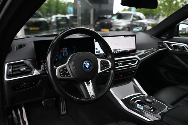BMW i4 eDrive40 High Executive M Sport / Schuif-kanteldak / Trekhaak / M Sportstoelen / Comfort Access / Parking Assistant Plus / Stuurverwarming