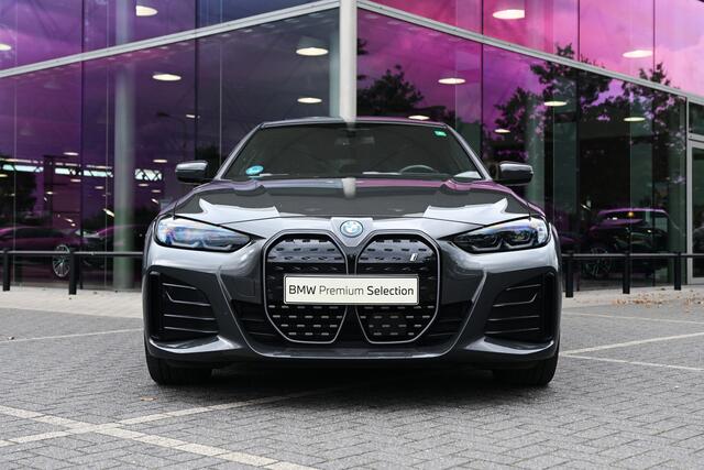 BMW i4 eDrive40 High Executive M Sport / Schuif-kanteldak / Trekhaak / M Sportstoelen / Comfort Access / Parking Assistant Plus / Stuurverwarming