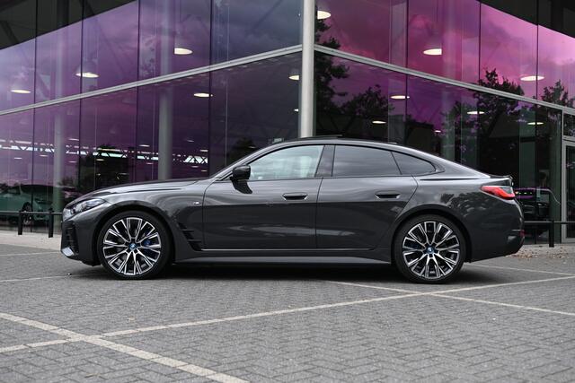 BMW i4 eDrive40 High Executive M Sport / Schuif-kanteldak / Trekhaak / M Sportstoelen / Comfort Access / Parking Assistant Plus / Stuurverwarming