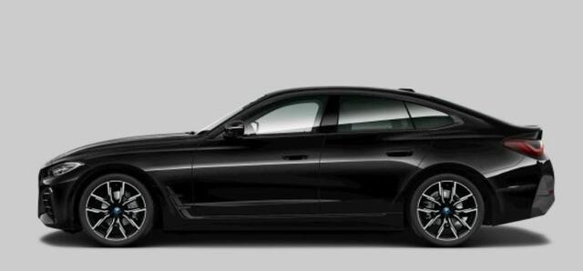 BMW i4 eDrive35 70 kWh M Sport - Trekhaak - Driving Assistant Professional - Harman Kardon - Parking Assistant Plus - Stuurwielrand verwarmd - Comfort Access - BMW Live Cockpit Professional -