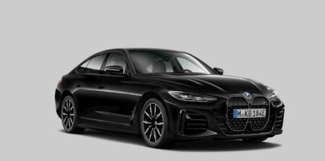 BMW i4 eDrive35 70 kWh M Sport - Trekhaak - Driving Assistant Professional - Harman Kardon - Parking Assistant Plus - Stuurwielrand verwarmd - Comfort Access - BMW Live Cockpit Professional -