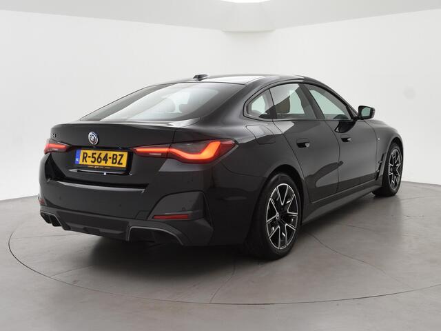 BMW i4 eDrive40 84 kWh M-SPORT + ADAPTIVE CRUISE | SFEERVERLICHTING | LEDER SPORTINTERIEUR