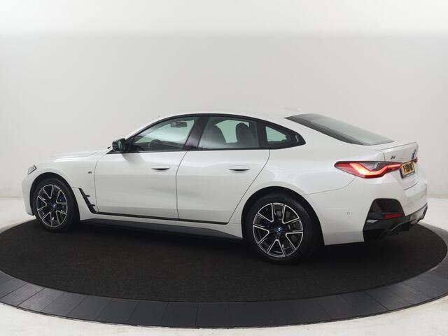BMW i4 M50 High Executive 84 kWh | SOH 94.5% | Leder | Adaptive cruise | M-Sport stoelen | Head up | 360 camera | Memory | Stuur/stoel verwarming | M-sport stuur |