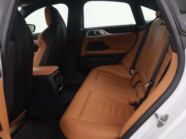 BMW i4 M50 High Executive 84 kWh | SOH 94.5% | Leder | Adaptive cruise | M-Sport stoelen | Head up | 360 camera | Memory | Stuur/stoel verwarming | M-sport stuur |