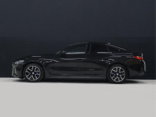 BMW i4 M50 High Executive 84 kWh [SCHUIFKANTELDAK, HARMAN/KARDON, APPLE CARPLAY, ANDROID, CRUISE CONTROL, STOELVERWARMING, MEMORY SEATS, HEAD UP DISPLAY, DIGITAL DASH, CAMERA, PDC 360, LEDER, SFEERVERLICHTING, ELEKTRISCHE A
