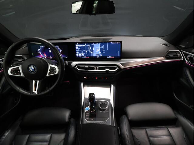 BMW i4 M50 High Executive 84 kWh [SCHUIFKANTELDAK, HARMAN/KARDON, APPLE CARPLAY, ANDROID, CRUISE CONTROL, STOELVERWARMING, MEMORY SEATS, HEAD UP DISPLAY, DIGITAL DASH, CAMERA, PDC 360, LEDER, SFEERVERLICHTING, ELEKTRISCHE A