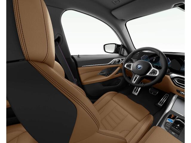 BMW i4 M50 High Executive 84 kWh Panoramadak - Driving Assistant Professional - Harman Kardon - Stuurwielrand verwarmd - Elektrisch verwarmde/verstelbare stoelen - Parking Assistant Plus - Getinte Ruiten -