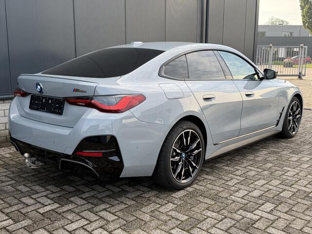 BMW i4 M50 High Executive 84 kWh 19"/SOH 99%/Schuif-kanteldak/Trekhaak/Leder + memory/Stoel + stuurverwarming/Harman Kardon/Dodehoek/Adaptieve cruise/Keyless/360 camera