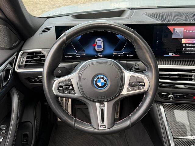 BMW i4 M50 High Executive 84 kWh 19"/SOH 99%/Schuif-kanteldak/Trekhaak/Leder + memory/Stoel + stuurverwarming/Harman Kardon/Dodehoek/Adaptieve cruise/Keyless/360 camera