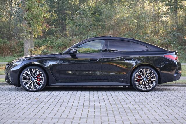 BMW i4 M50 High Executive 84 kWh M-Sport Pro | Pano | HUD | ACC | H&K | 20" | Memory | 360 | Keyless | Alarm kl.3 | Carbon interieur | Etc.