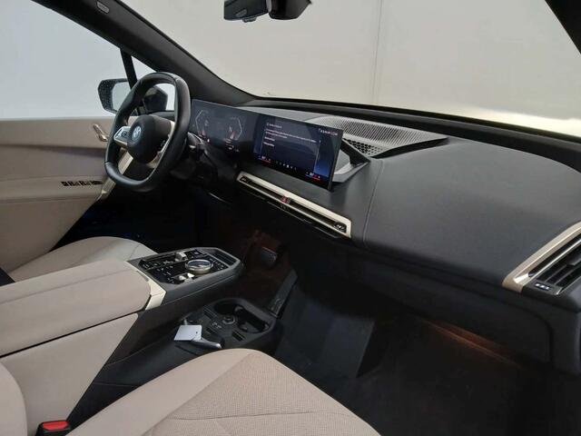 BMW iX xDrive40 | Sportpakket | 21" | Driving Assistant Plus | Flexible Fast Charger 2.0