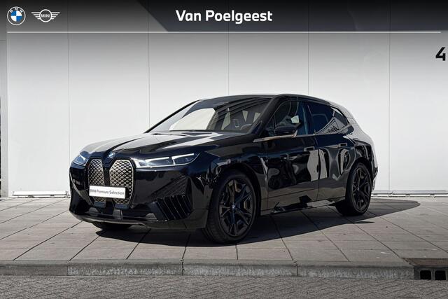 BMW iX xDrive40 22 Inch / Sportpakket / Glazen Dak / Driving Prof / Comfort Acces / Harman Kardon / Getinte Ramen Achter / parking Plus / Soft Close / Warmte Comfort pakket