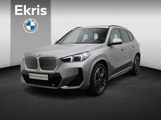 BMW iX1 eDrive20 M Sport Edition | Premium Pack | Comfort Pack | Travel Pack | Trekhaak | Panoramadak | Elektrisch Verstelbare Sportstoelen | Harman Kardon | 19''
