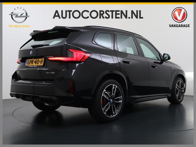 BMW iX1 eDrive20 67kWh M-Sport-Pro Leder/Alcantara Premium 19" LED Connected-Pro Warmtepomp Camera Navi Ecc Pdc 100% SOH Apple Carplay Android Auto Stoelverwarming Adap.demping Standverwarming/koeling Zwarte-Hemel Drive-Assist Elek.Achterklep Lmv Led Isofix DAB K