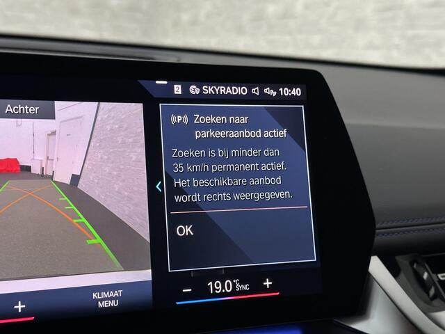 BMW iX1 30 313pk X-Drive M-Sport Performance | Adaptief Led | Sportstoelen | Keyless | Adaptieve Cruise en Struurwielverw. voorbereid | Antraciet Hemel | Carplay | Sfeerverlichting | 1200kg Trekgewicht | Camera | Bovag Garantie.