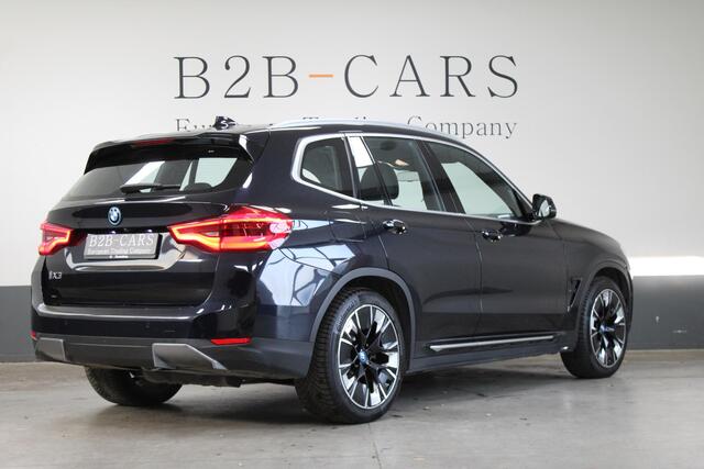 BMW iX3 Executive 80 kWh | SOH 98% | Panorama | Trekhaak | Zwart Lederen bekleding