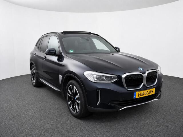 BMW iX3 High Executive Edition 80 kWh SOH 98,6% Panoramadak Trekhaak Navigatie Apple CarPlay Android Auto Camera Parkeerhulp Adaptive Cruise Control Stoelverwarming Full Led Leder Climate Control Lichtmetalen velgen