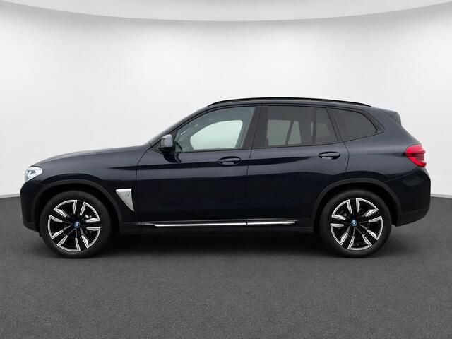 BMW iX3 High Executive Edition 80 kWh SOH 98,6% Panoramadak Trekhaak Navigatie Apple CarPlay Android Auto Camera Parkeerhulp Adaptive Cruise Control Stoelverwarming Full Led Leder Climate Control Lichtmetalen velgen