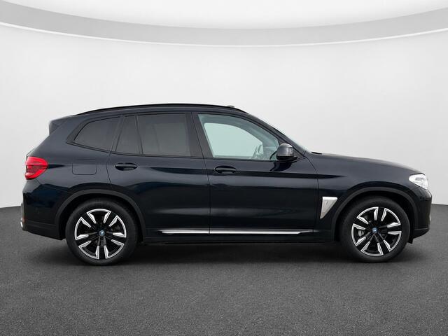 BMW iX3 High Executive Edition 80 kWh SOH 98,6% Panoramadak Trekhaak Navigatie Apple CarPlay Android Auto Camera Parkeerhulp Adaptive Cruise Control Stoelverwarming Full Led Leder Climate Control Lichtmetalen velgen