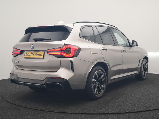 BMW iX3 M Sport 80 kWh 286pk Dealer O.H | Panodak | Adaptive Cruise | Camera | Lederen Sportstoelen Memory & Verwarmd | Sfeerverlichting | Blis | Apple Carplay | Navigatie | DAB | 19"L.M